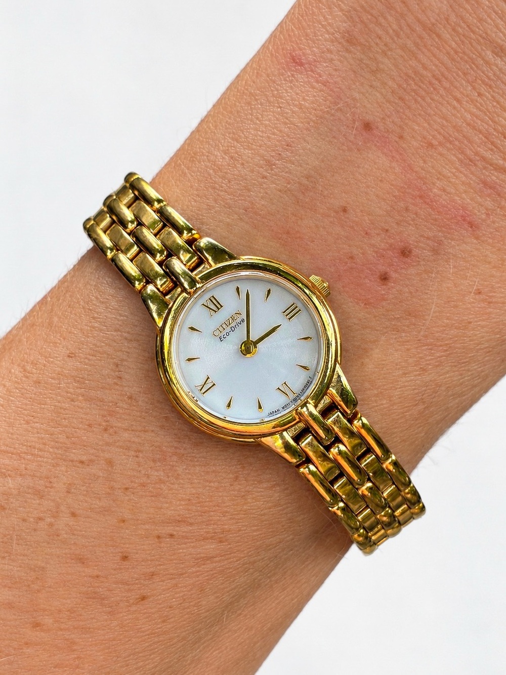 Citizen Eco-Drive Gold Tone Women’s Watch White Dial Roman Numerals